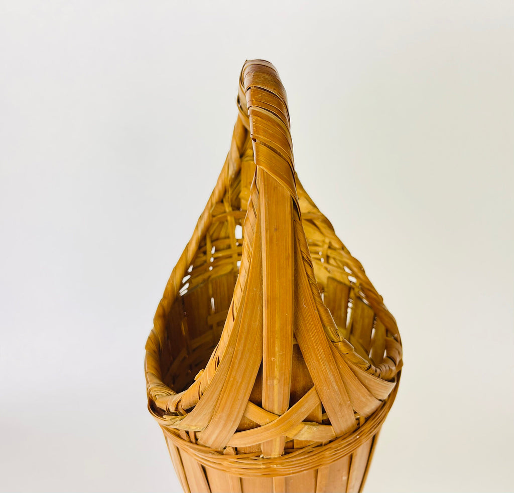 Product image for 'vintage 1970s tall wicker wine basket with pedestal base handle' (view 6d39bd)