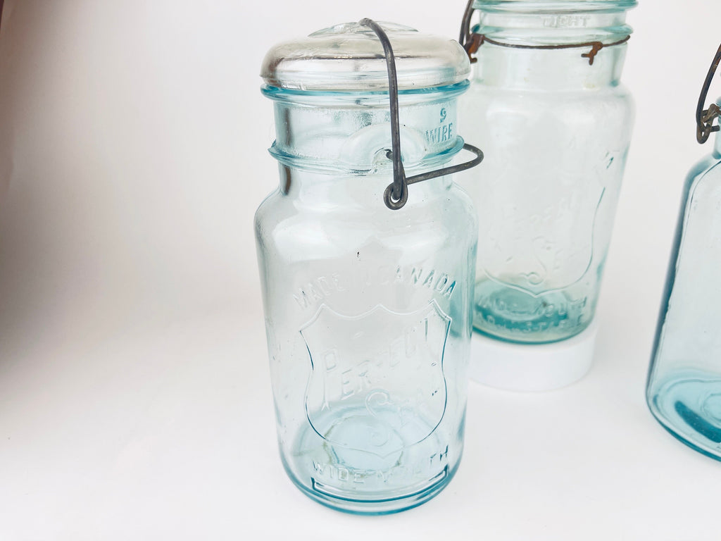 Product image for 'antique safety seal wide mouth aqua blue glass jar 2 pint capacity lightning metal hinge clasp made in canada sold separately 1' (view c7c82b)