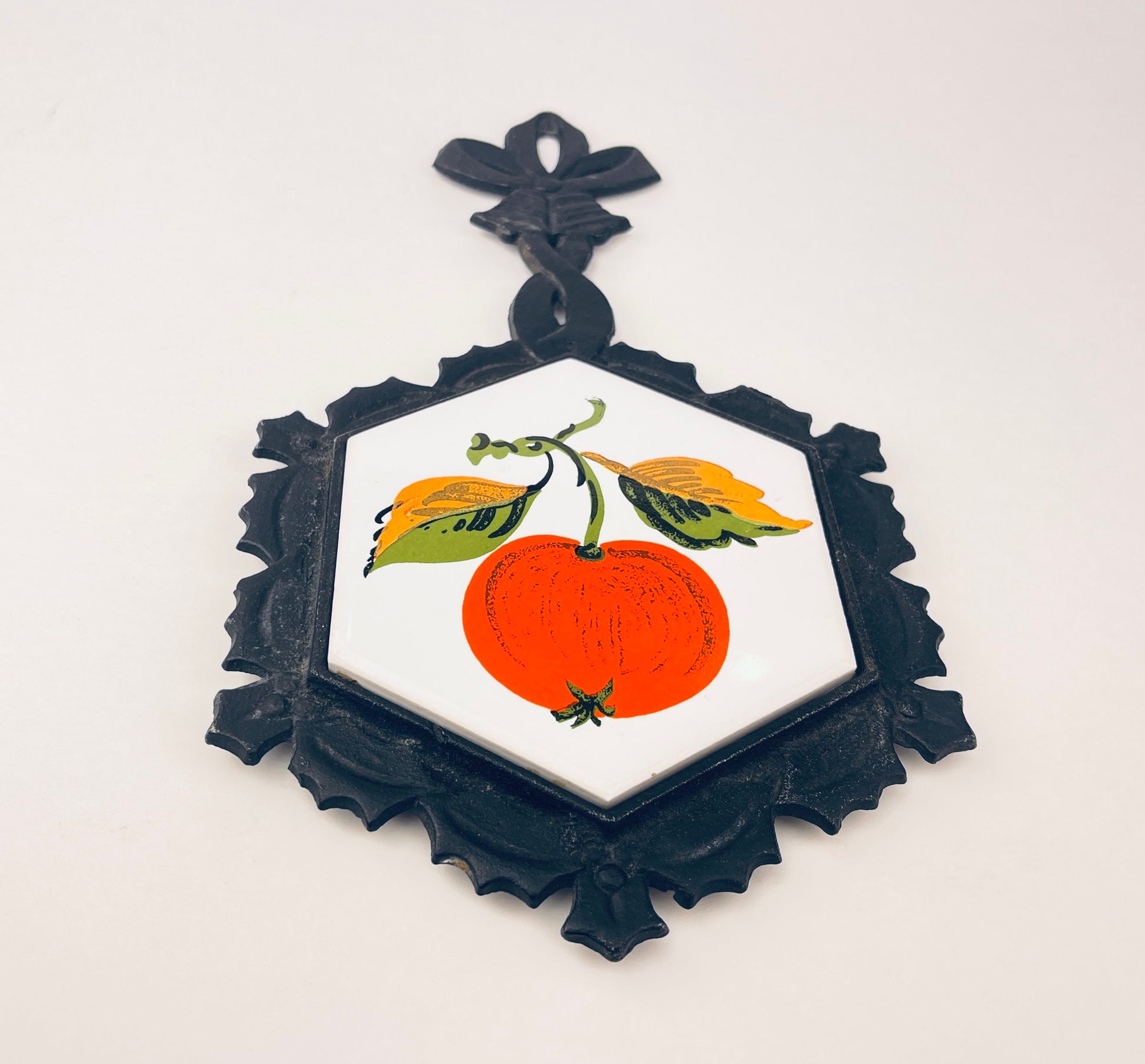 Product image for 'vintage cast iron ceramic apple design trivet hot pot plate holder made in japan by lego wedding bells gift' (view a73def)