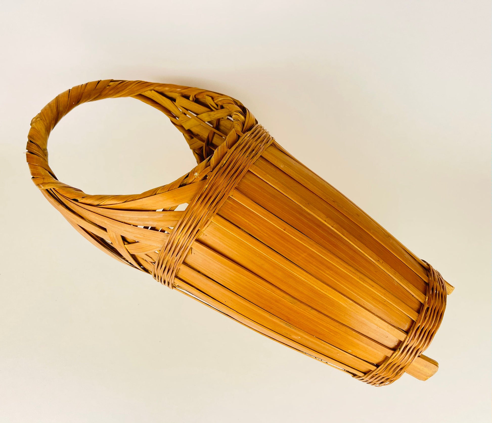 Product image for 'vintage 1970s tall wicker wine basket with pedestal base handle' (view 7ac64b)