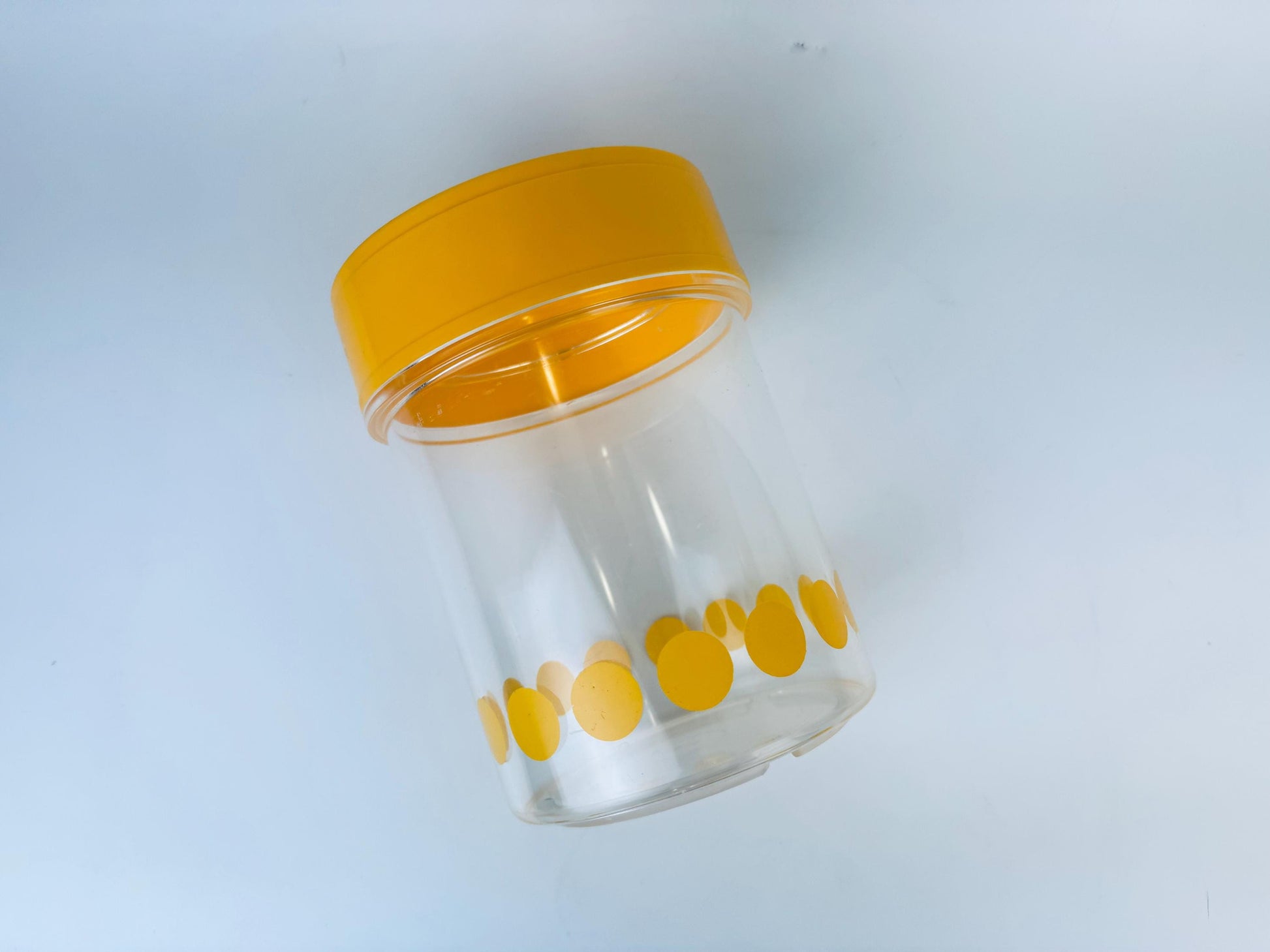 Product image for 'vintage mcm danish yellow polka dot plastic countertop canister made in denmark by garant plast' (view b899c5)