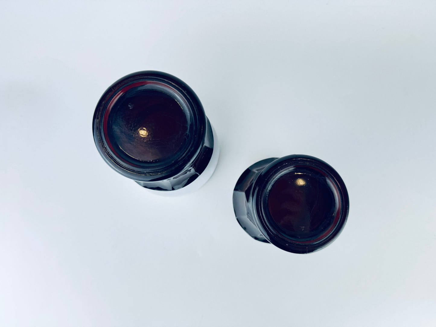 Product image for 'vintage georgian ruby red chiselled heavy glass pedestal tumbler glasses set of two 2 anchor hocking made in usa' (view 7eb3de)