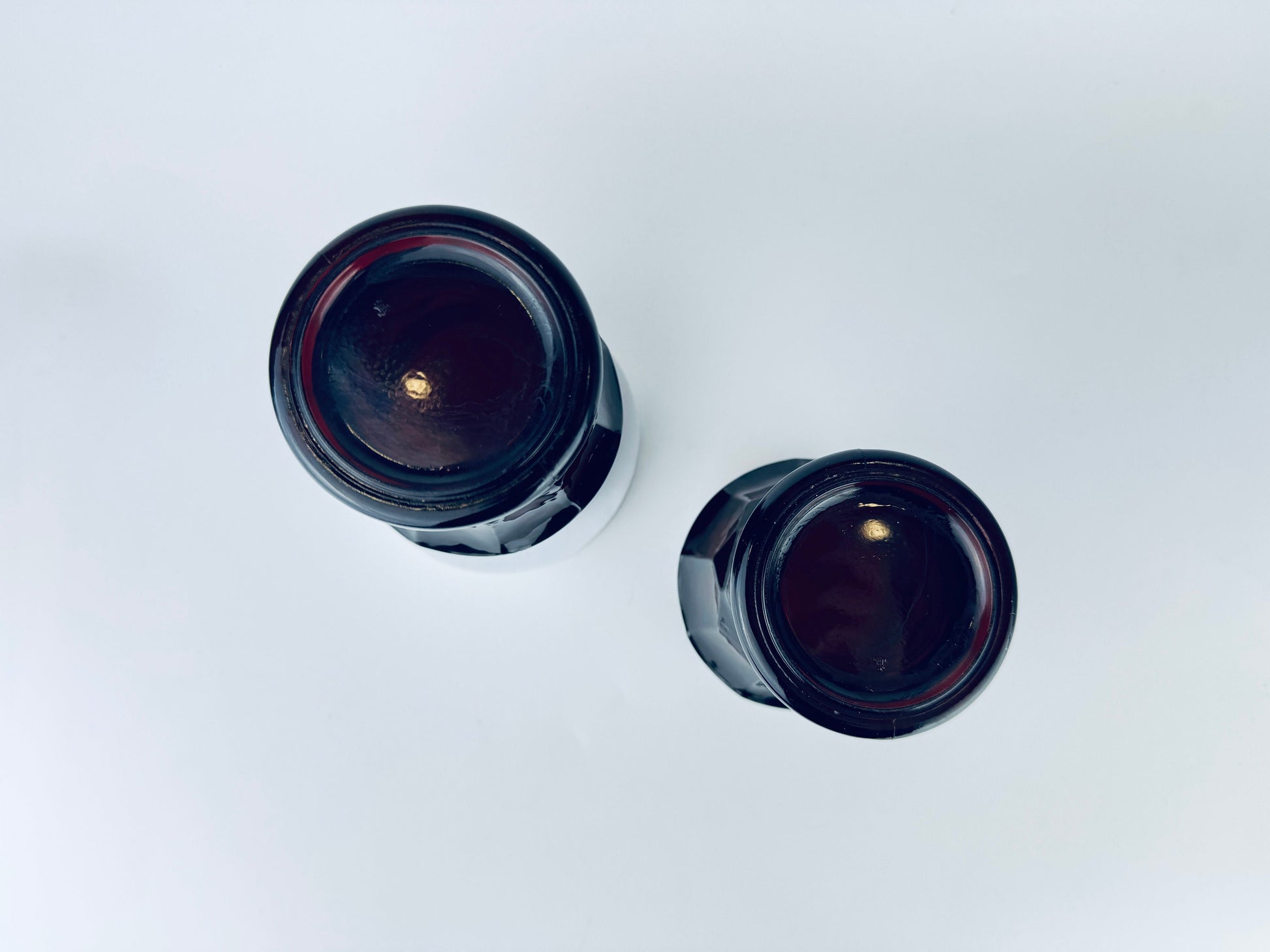 Product image for 'vintage georgian ruby red chiselled heavy glass pedestal tumbler glasses set of two 2 anchor hocking made in usa' (view 7eb3de)