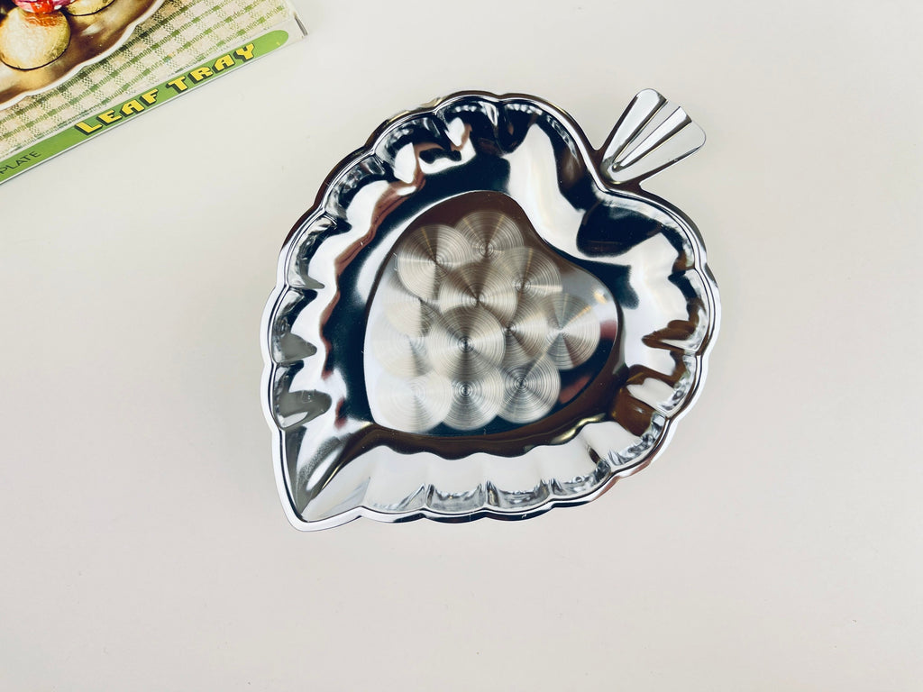 Product image for 'vintage chrome plate leaf tray swirl pattern centre new old stock nos' (view 757871)