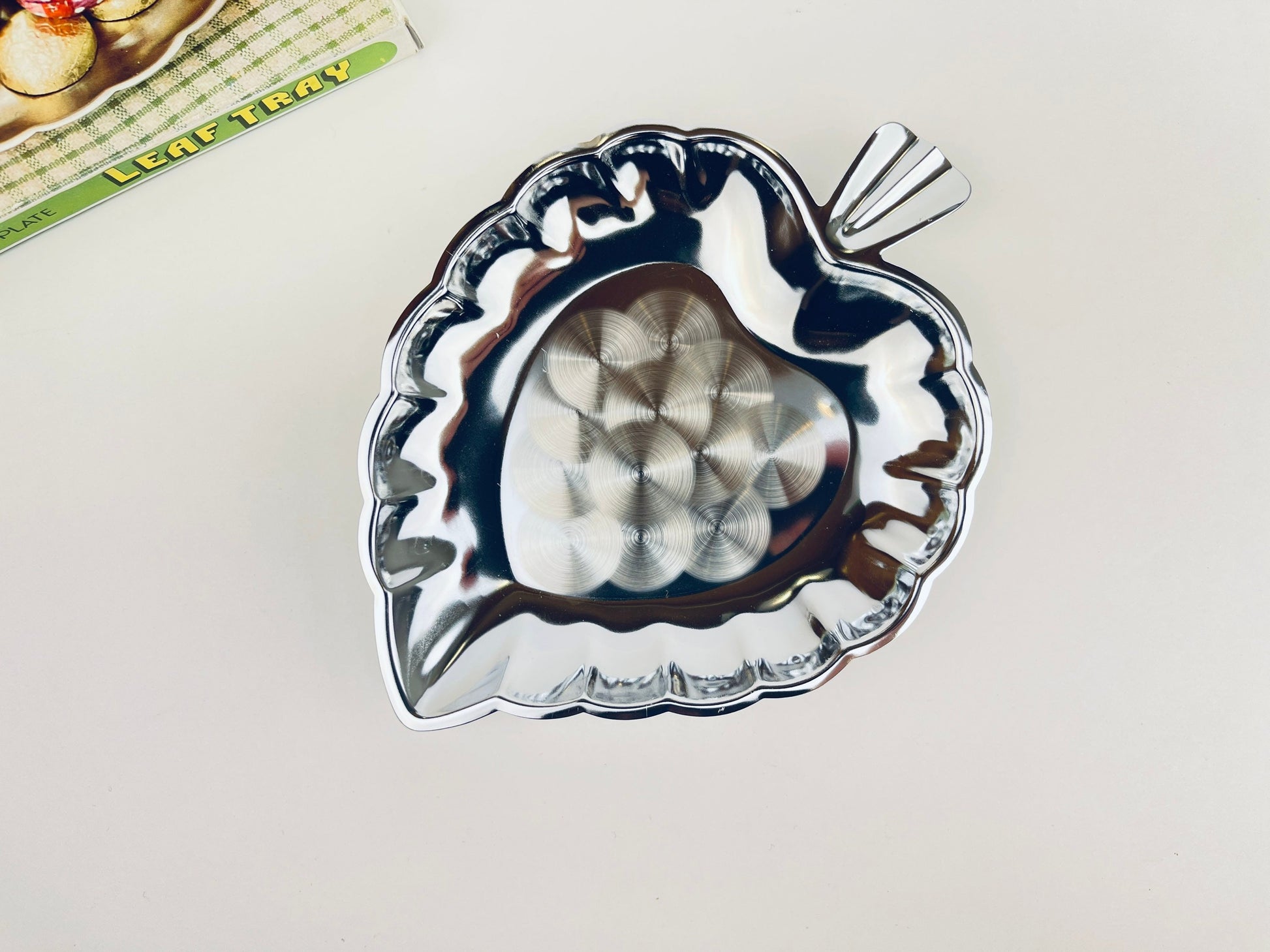 Product image for 'vintage chrome plate leaf tray swirl pattern centre new old stock nos' (view 757871)
