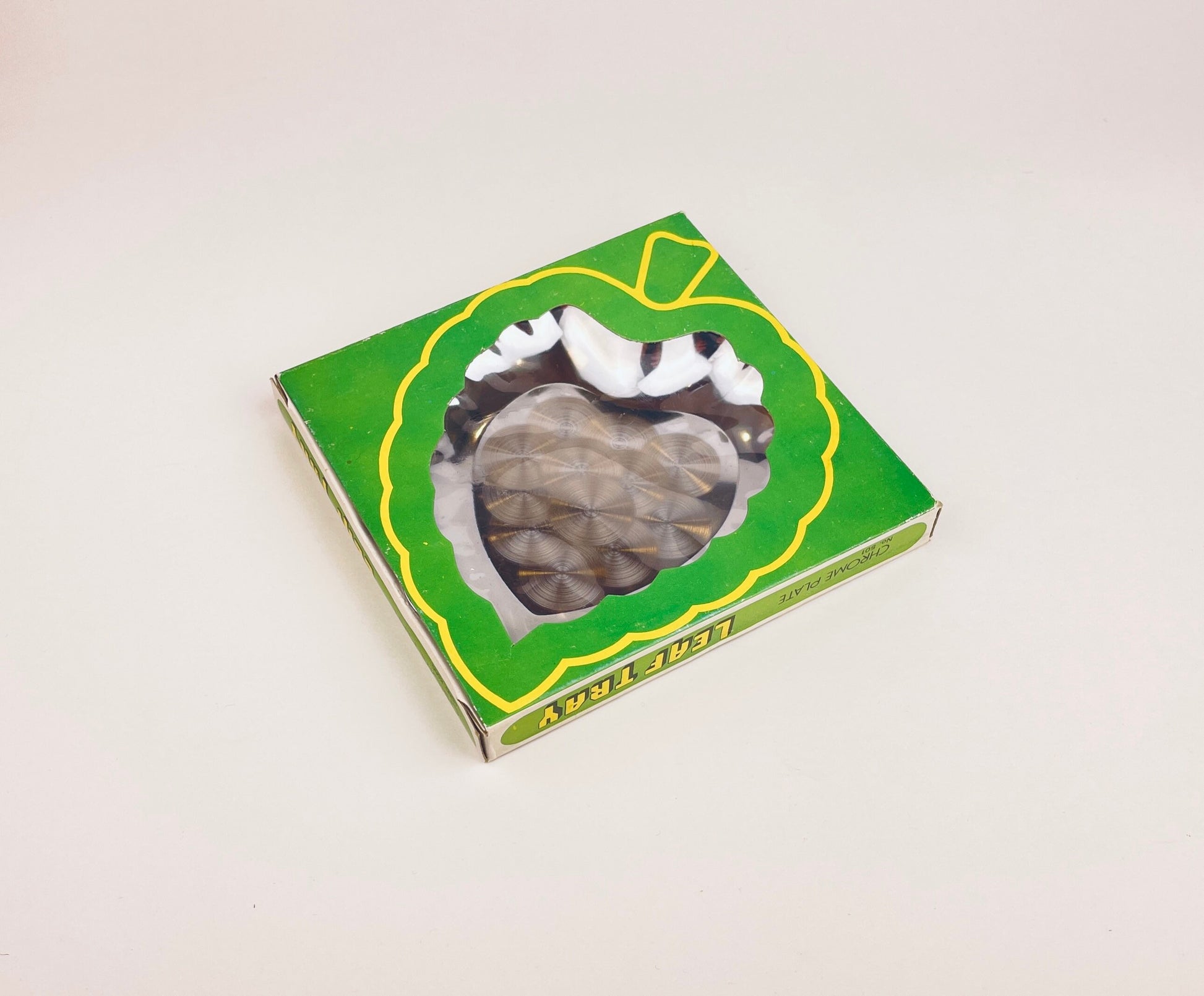 Product image for 'vintage chrome plate leaf tray swirl pattern centre new old stock nos' (view 21344d)