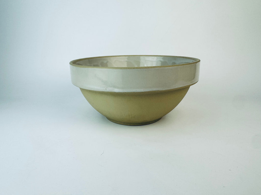 Ceramic bowl with two-tone design on a white background