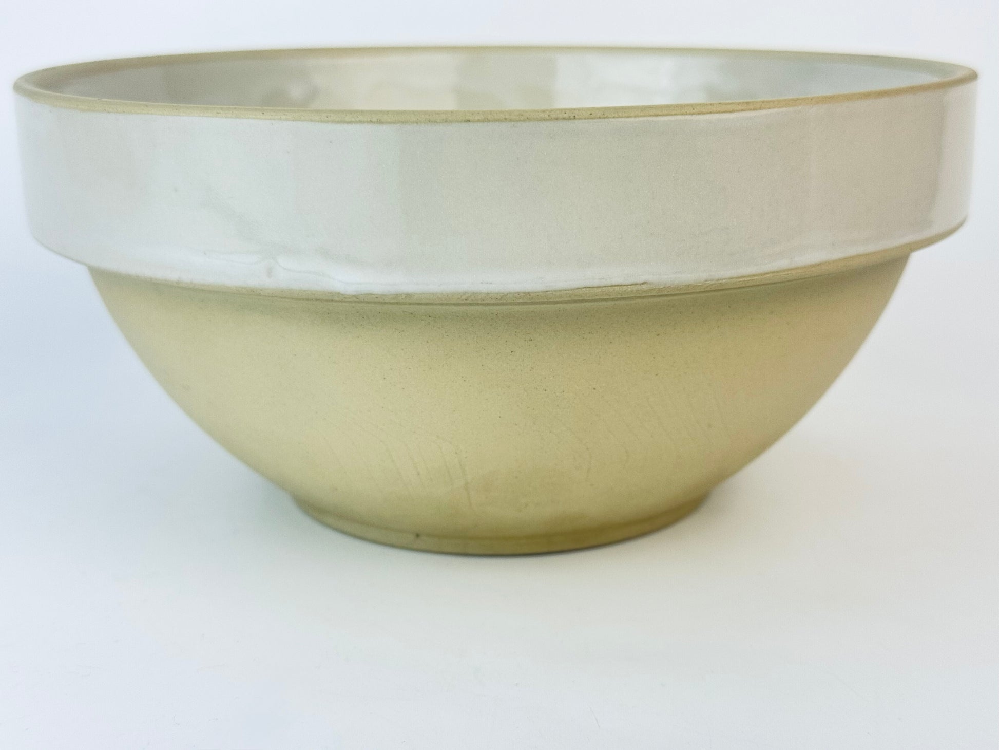 Ceramic bowl with two-tone design on a white background