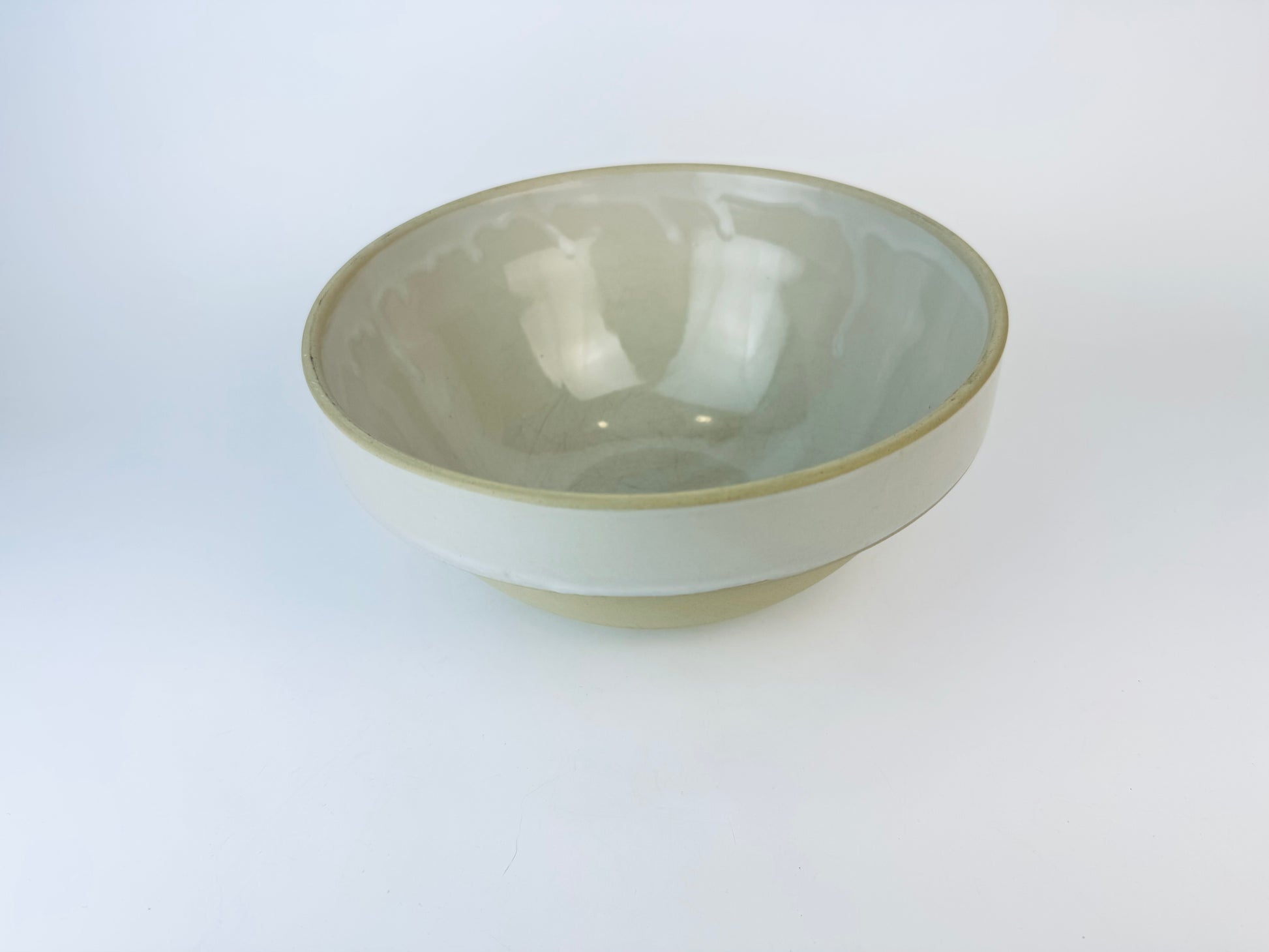 Ceramic bowl with a textured surface on a white background