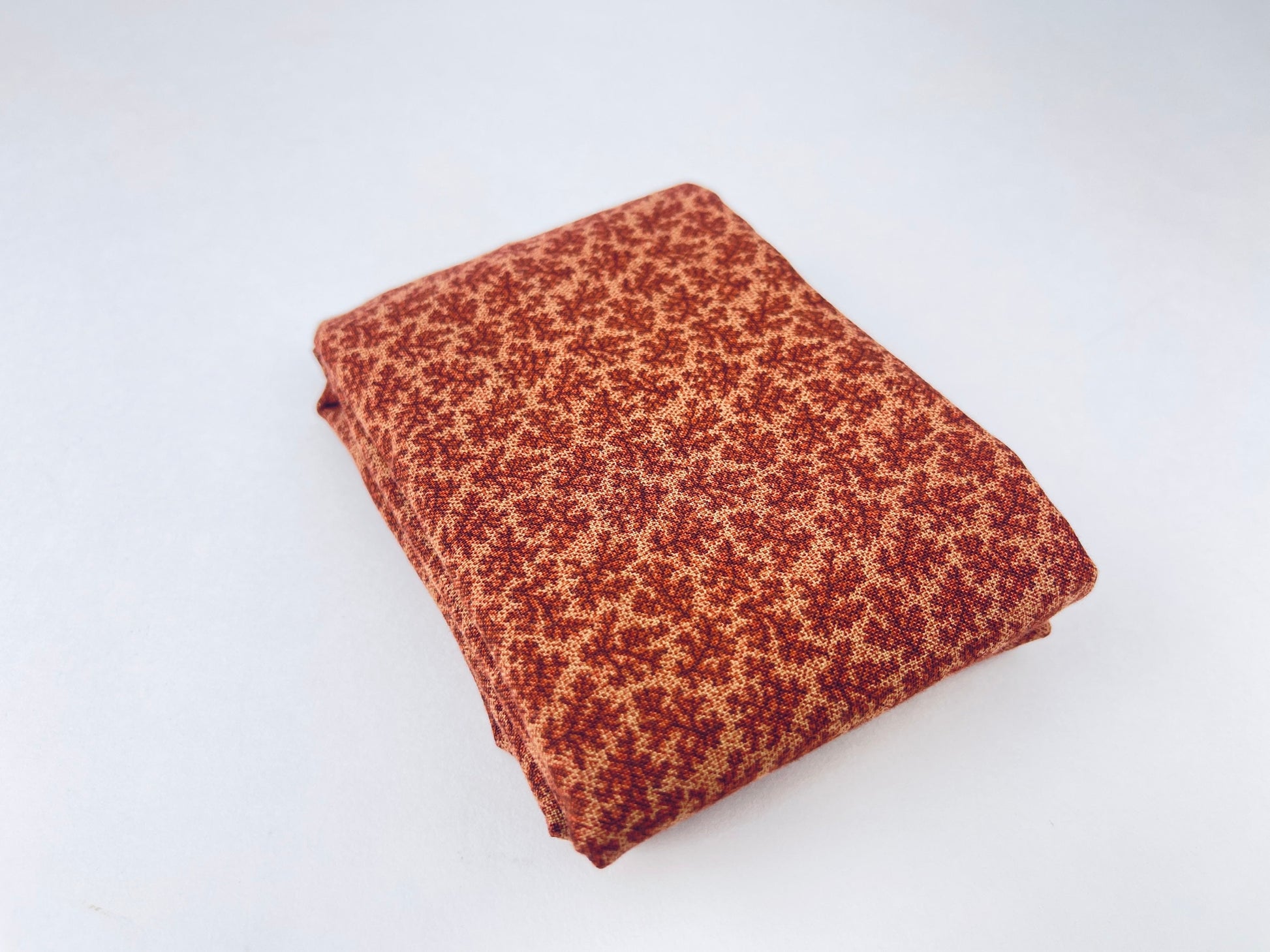Product image for 'vintage red cream textured fabric retro pattern for quilting or upholstery' (view a1e6a8)