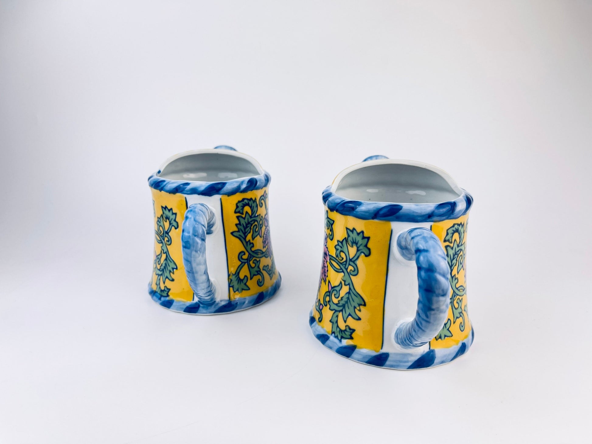 Product image for 'vintage hand painted blue yellow floral print ceramic watering can pot with handle rope handle bella case by ganz sold separately' (view 6ab596)