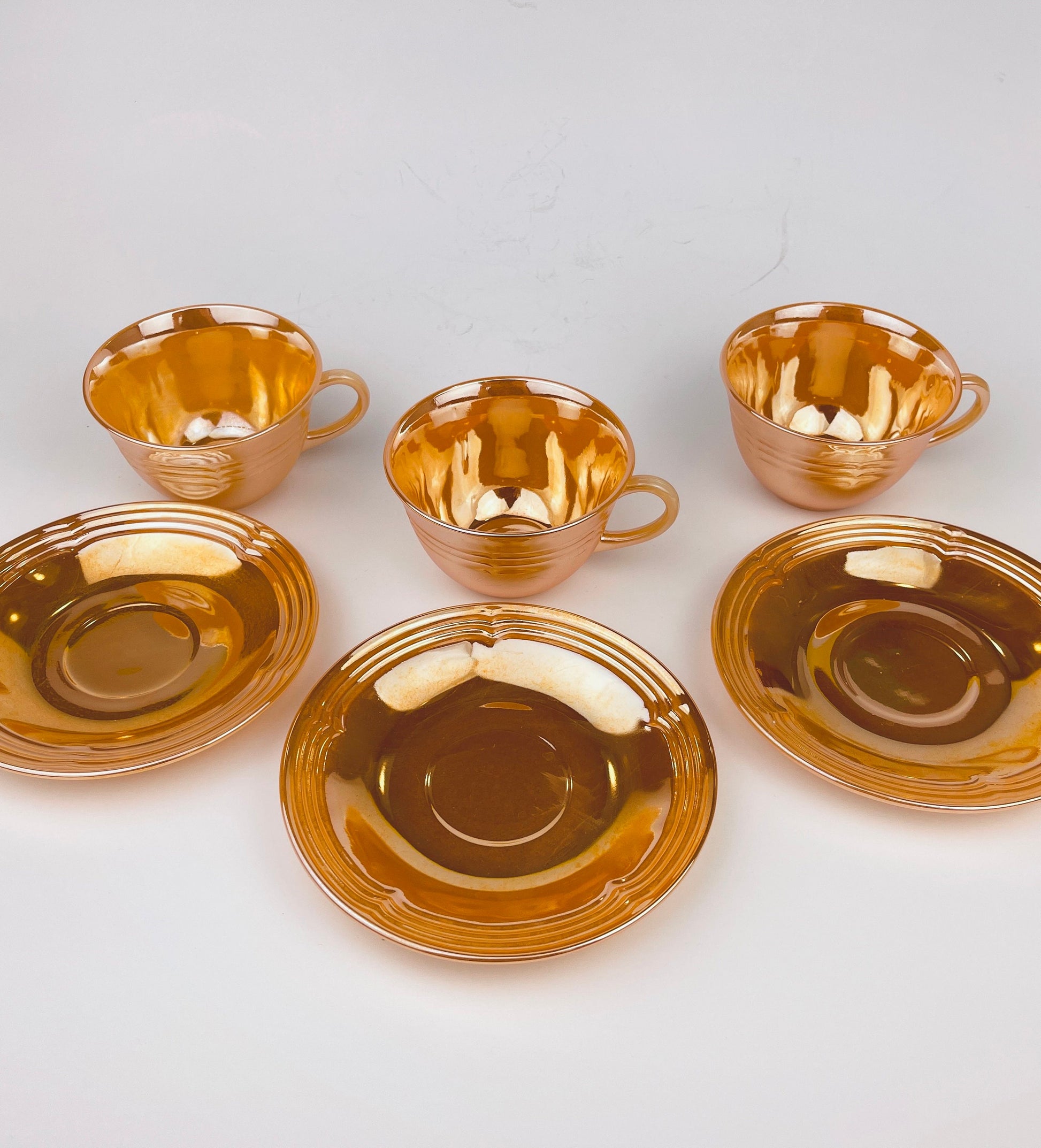 Product image for 'vintage peach lustreware swirl tea cup saucer set replacement anchor hocking fire king made in usa cup saucer set sold separately' (view 8c0390)
