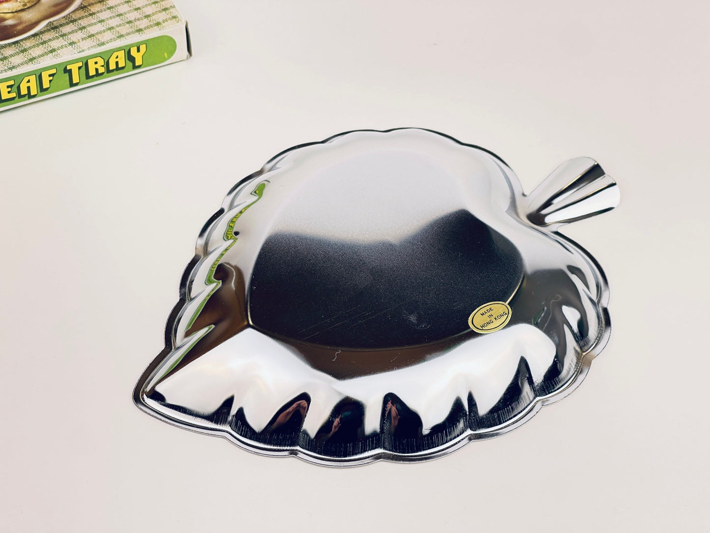 Product image for 'vintage chrome plate leaf tray swirl pattern centre new old stock nos' (view 1403f5)