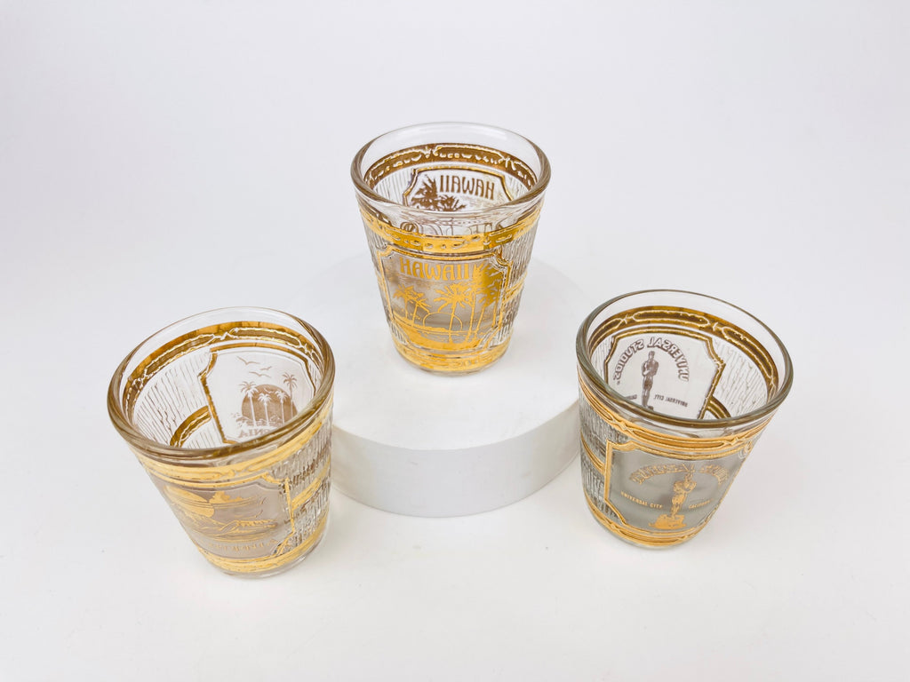 Product image for 'vintage culver tyrol heavy glass 22 kt gold souvenir shot glasses hawaii universal studios california sold individually' (view 3fa0ff)