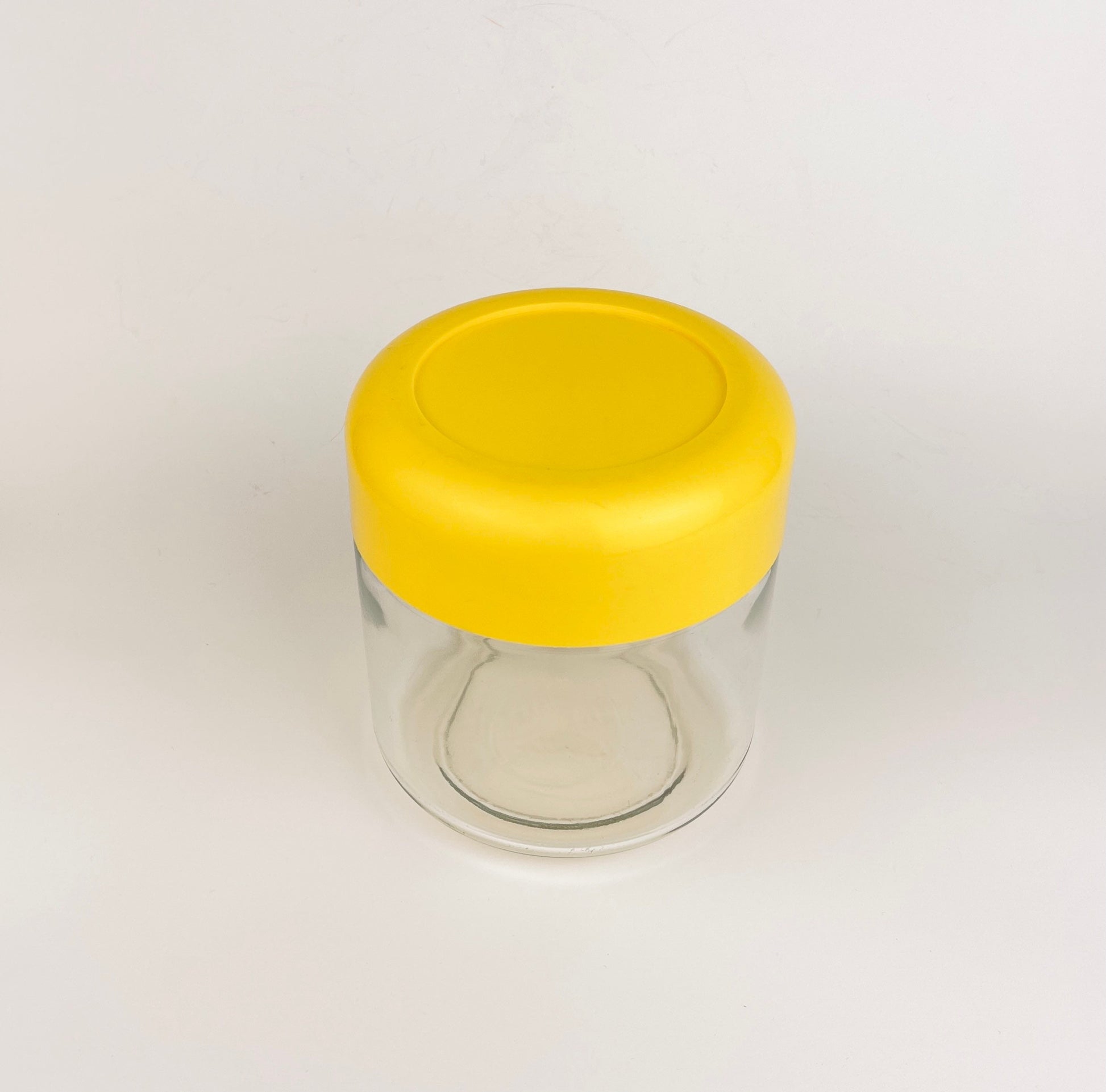 Product image for 'vintage heller designs by massimo vignelli yellow plastic top countertop canister' (view 641126)