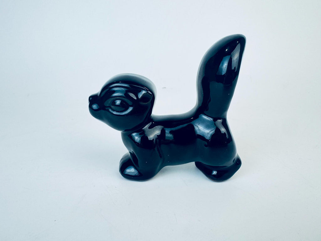 Product image for 'vintage kitsch black skunk red clay figurine made in japan' (view 3b388a)