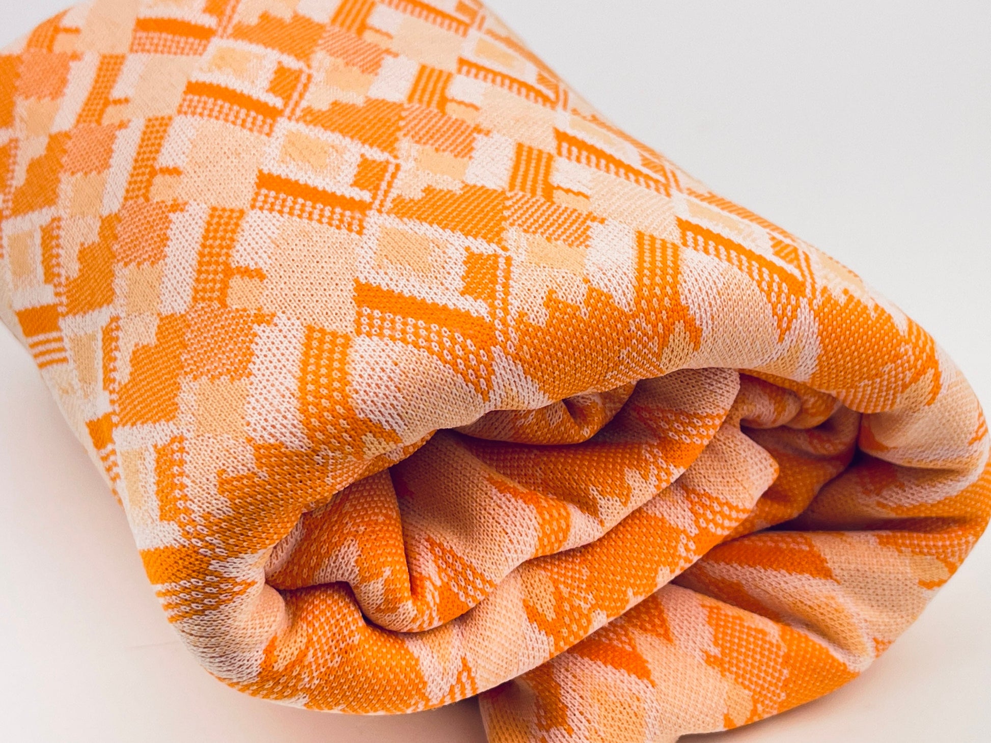 Product image for 'vintage orange white diamond polyester stretch fabric 45 x 62' (view 664a33)