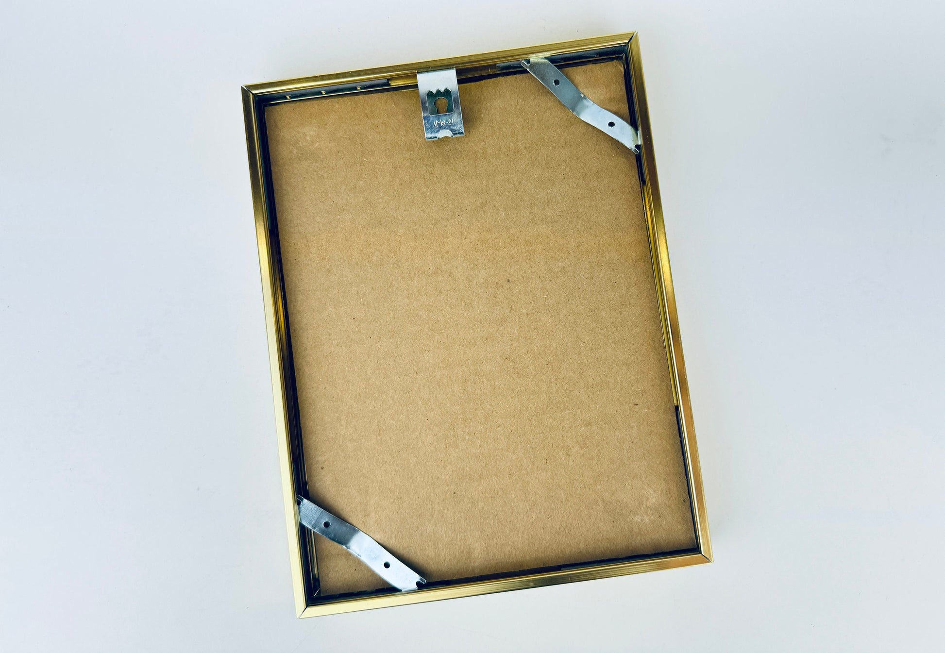 Product image for 'vintage wall mount brushed gold tone metal 6 x 8 picture frame pressure held back frames sold separately' (view fc727f)