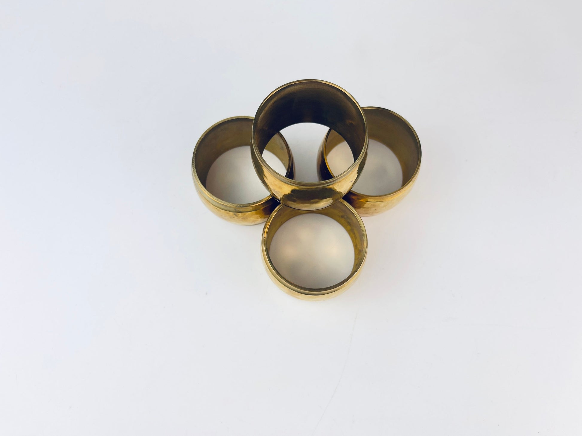 Product image for 'vintage hammered brass barrel shaped napkin ring holders set of four 4 attractive aged metal patina' (view 8cb102)