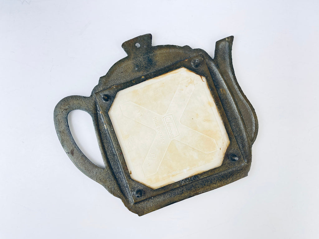 Product image for 'vintage kitsch tea kettle metal ceramic trivet fruit pig scene' (view 841e2c)