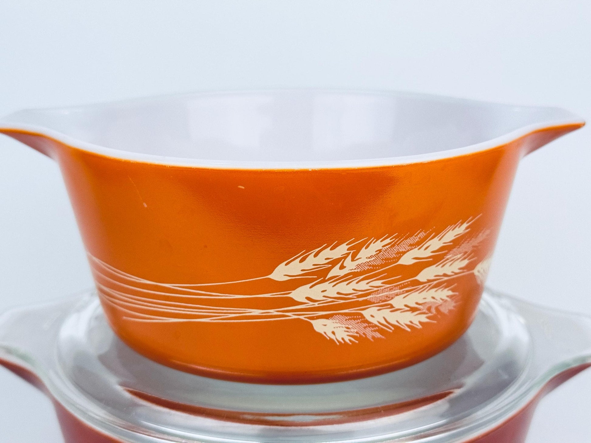 Product image for 'vintage autumn harvest wheat pattern pyrex bright orange casserole dishes dishes sold separately' (view 222552)
