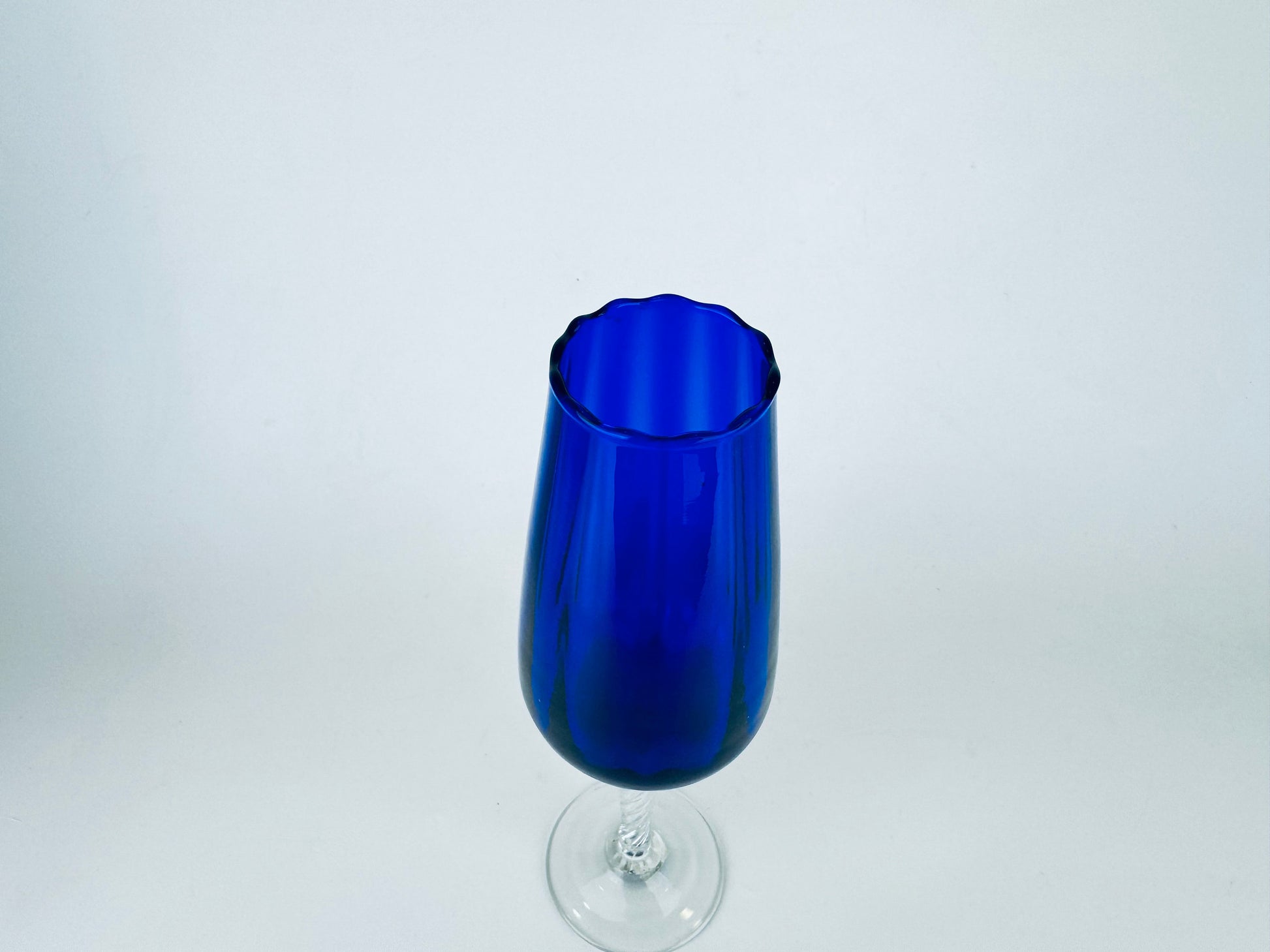Product image for 'vintage cobalt blue twisted clear stem glass vase made in japan' (view 48fcea)