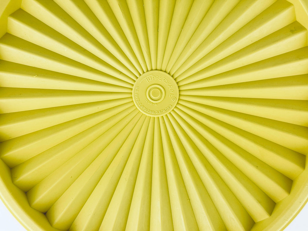 Product image for 'vintage yellow starburst design plastic tupperware stackable nesting countertop container 1204 1205 made in canada' (view 19642e)