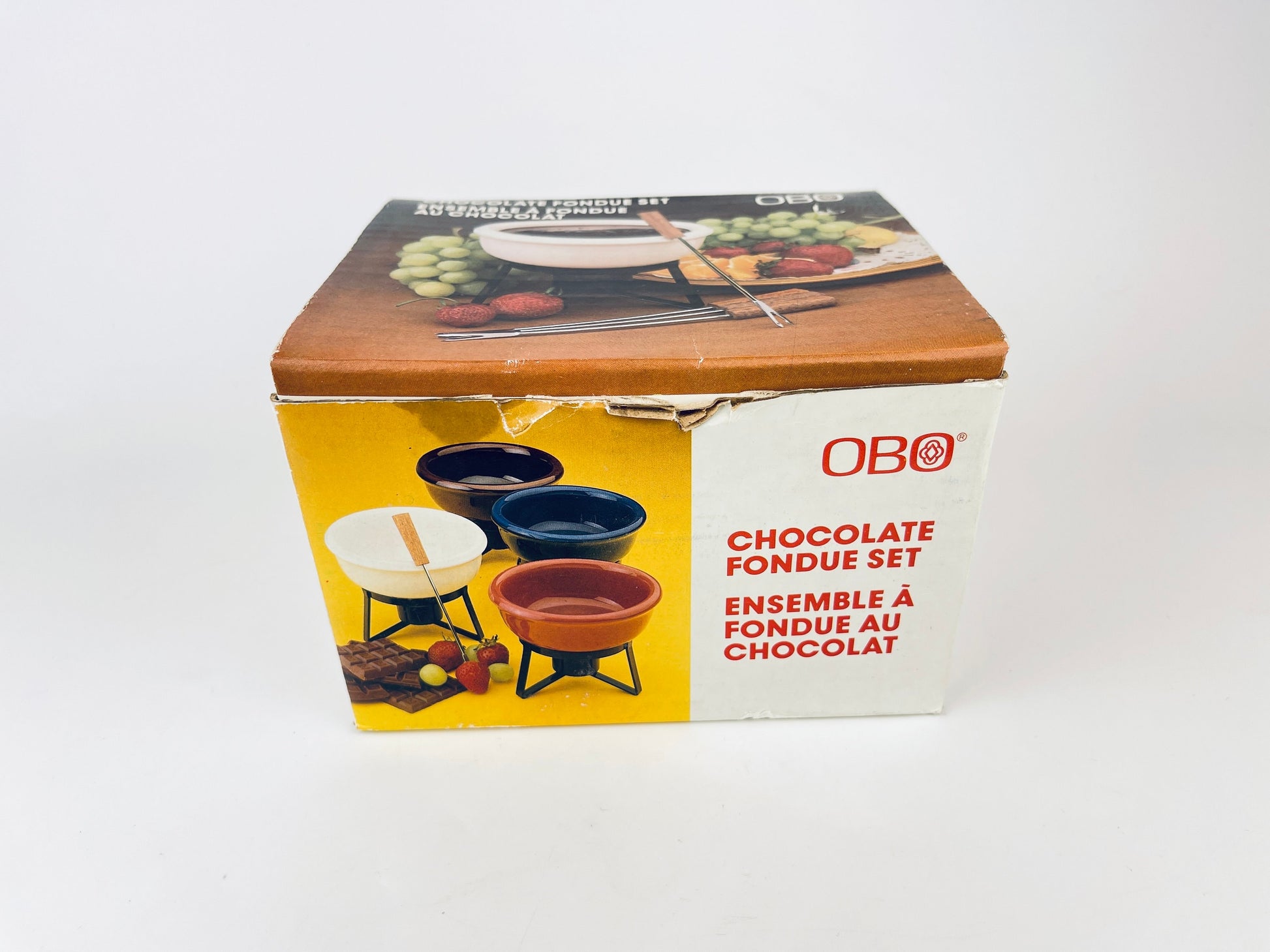 Product image for 'vintage obo cranberry ceramic chocolate fondue set new old stock nos' (view d96638)