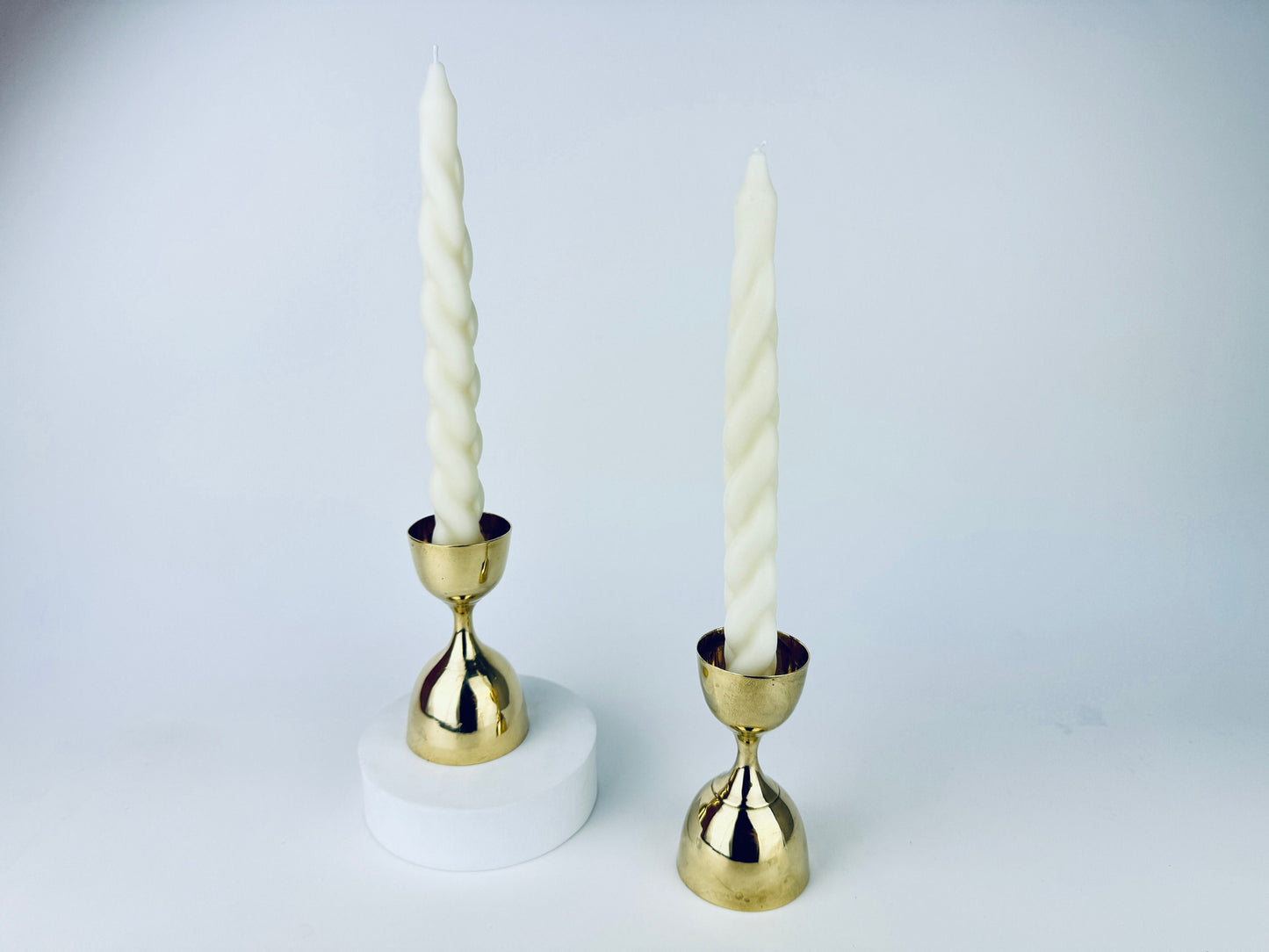 Product image for 'vintage hourglass shaped brass candlestick holders set of two 2' (view cd13f1)