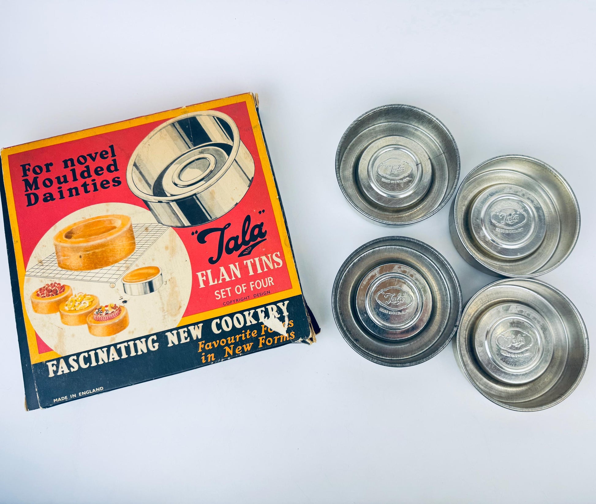 Product image for 'vintage 1950s tala flan tins set of four made in england' (view eaa35e)
