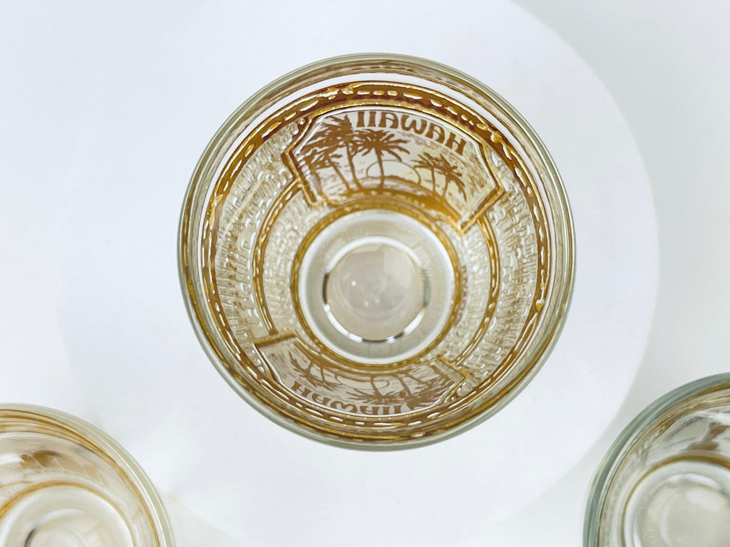 Product image for 'vintage culver tyrol heavy glass 22 kt gold souvenir shot glasses hawaii universal studios california sold individually' (view 395d84)