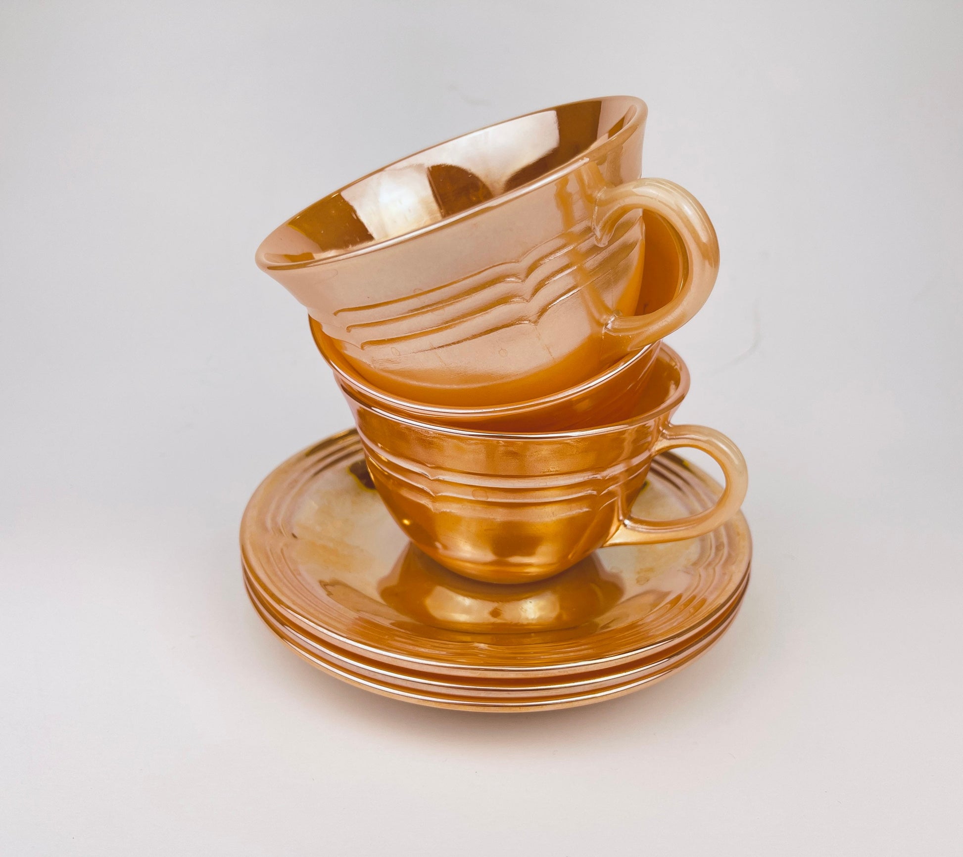 Product image for 'vintage peach lustreware swirl tea cup saucer set replacement anchor hocking fire king made in usa cup saucer set sold separately' (view 708497)