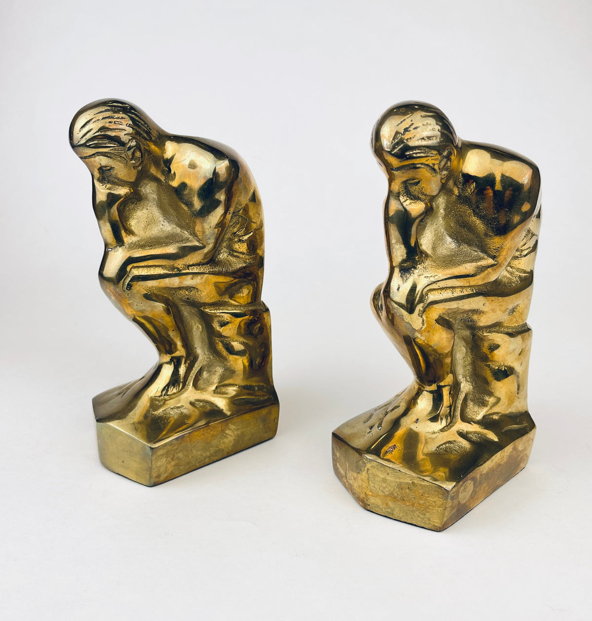 Product image for 'vintage solid brass thinker man bookends attractive aged metal patina gold decor' (view e04ea5)