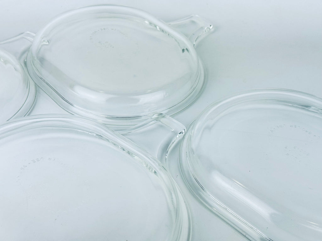 Product image for 'vintage pyrex clear glass grab it microwave oven plates set of two 2 600 b 15 cm x 20 cm made in usa sets sold separately' (view c2b2d5)