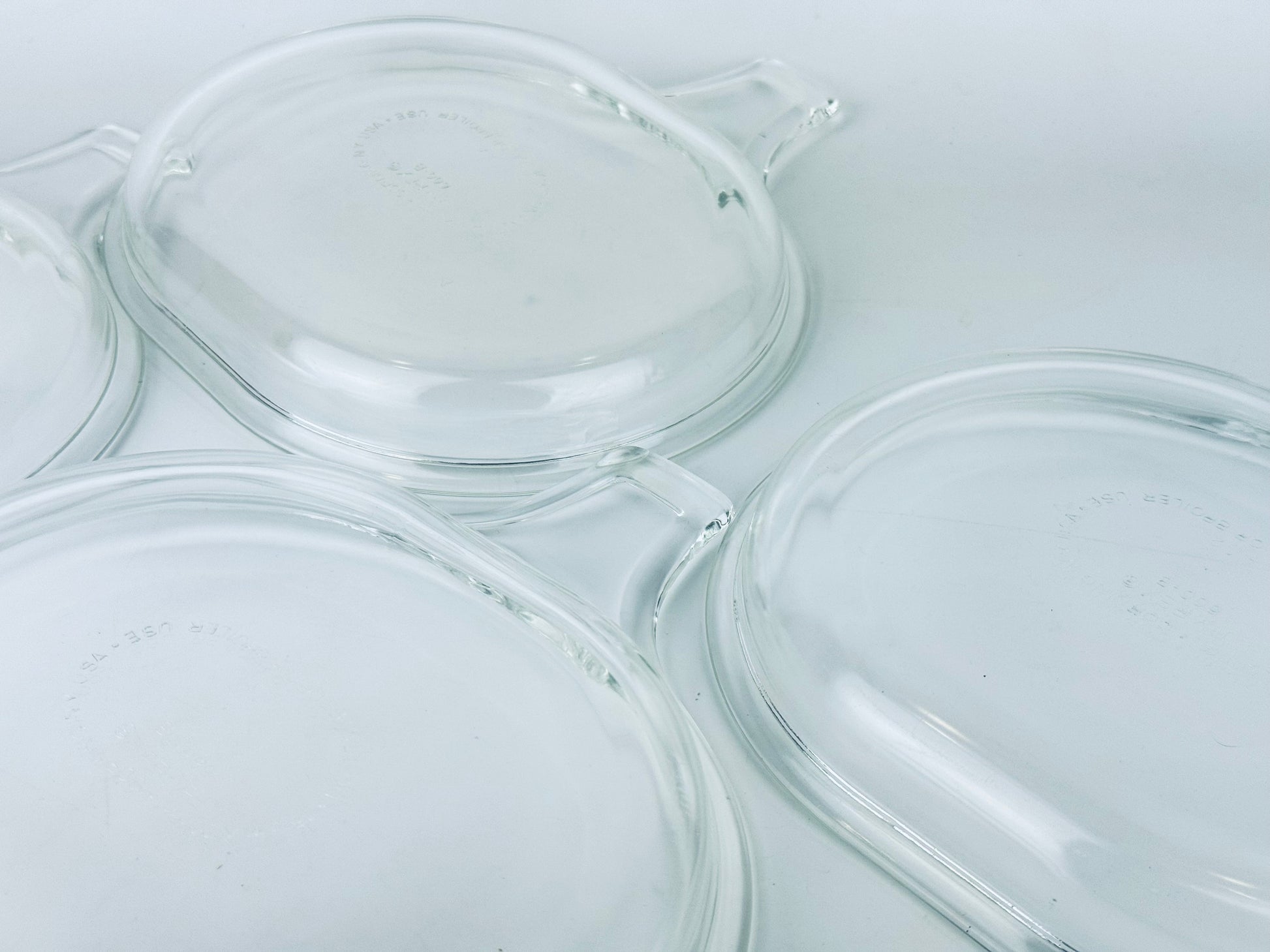 Product image for 'vintage pyrex clear glass grab it microwave oven plates set of two 2 600 b 15 cm x 20 cm made in usa sets sold separately' (view c2b2d5)