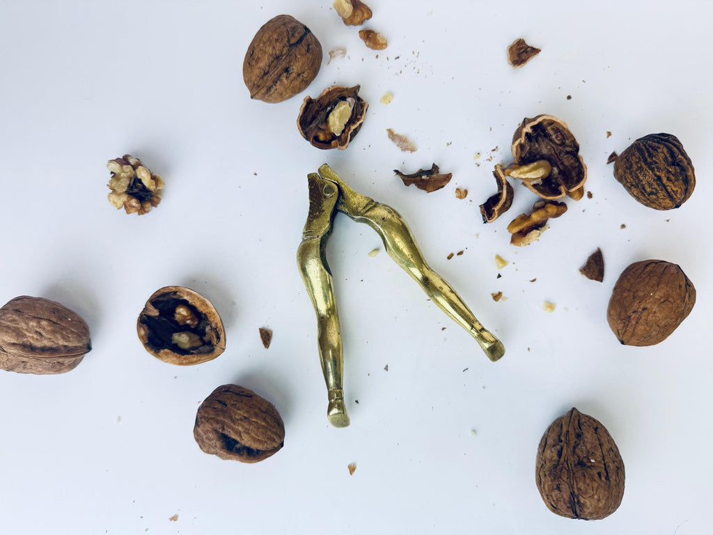 Product image for 'mid century brass leg nutcracker 1960s vintage brass kitchen gadget sculptural hand held nut cracker' (view e1219c)