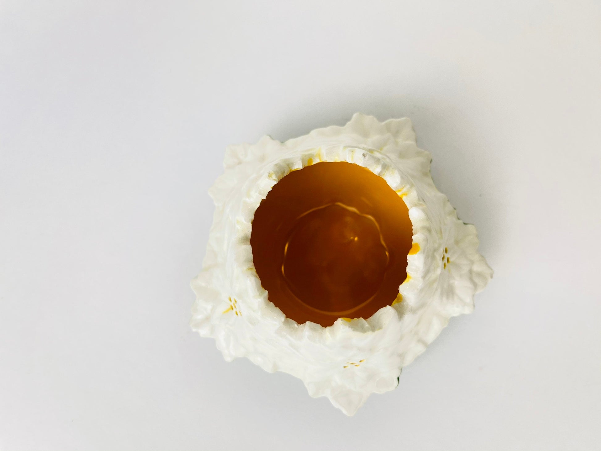 Product image for 'vintage tea light ceramic candle holder white flower green bottom' (view 1f96a0)