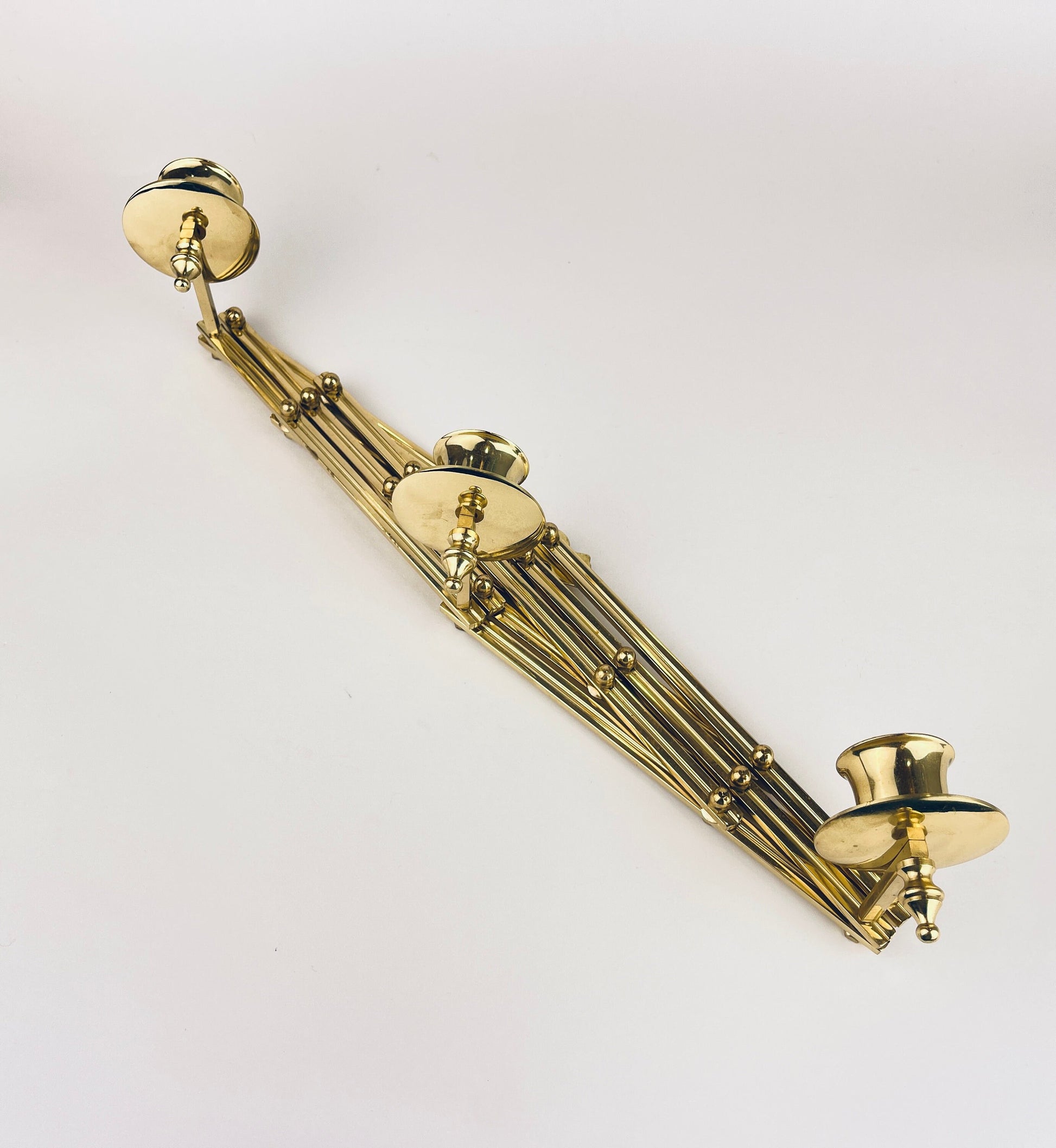 Product image for 'vintage wall mounted brass candlestick holders collapsible attractive aged patina' (view 367cf7)