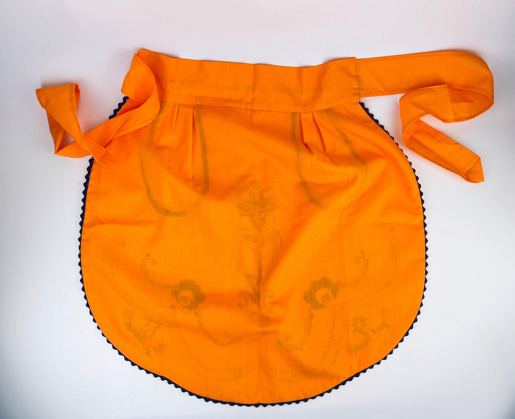 Product image for 'vintage embroidered floral oval waist apron orange brown duel eyelet pocket front' (view c7e214)