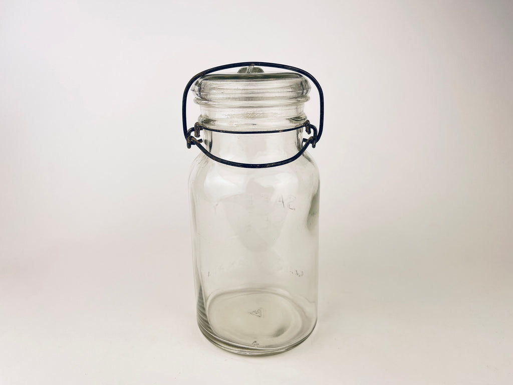 Product image for 'antique safety seal wide mouth glass jar 2 pint capacity metal hinge clasp aka lightning jar made in canada farmhouse decor' (view 99b88b)