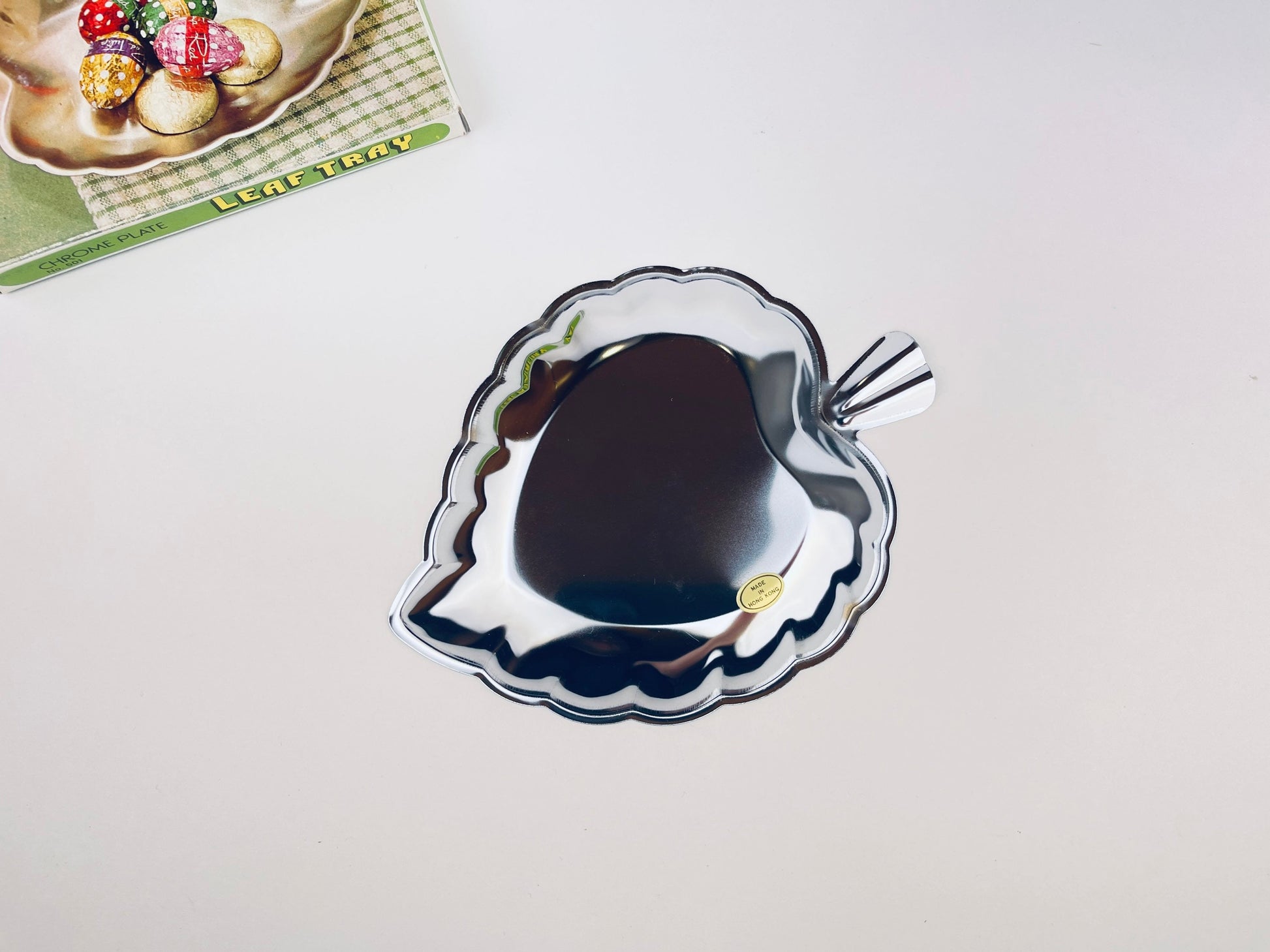 Product image for 'vintage chrome plate leaf tray swirl pattern centre new old stock nos' (view f897da)