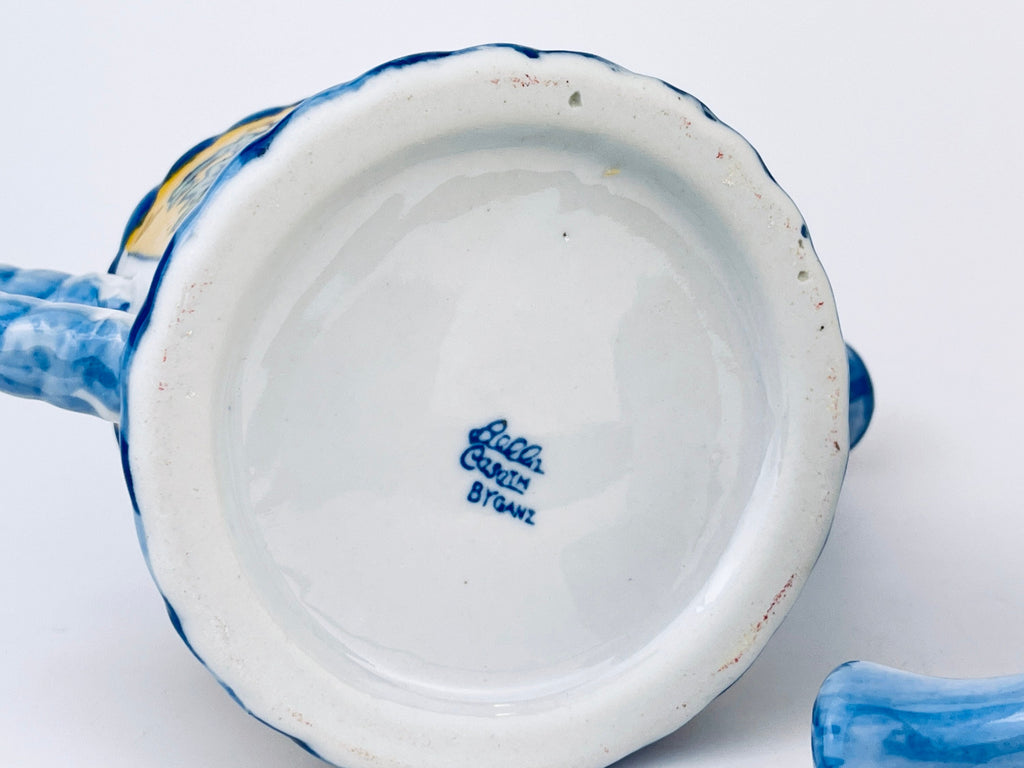 Product image for 'vintage hand painted blue yellow floral print ceramic watering can pot with handle rope handle bella case by ganz sold separately' (view 02984f)