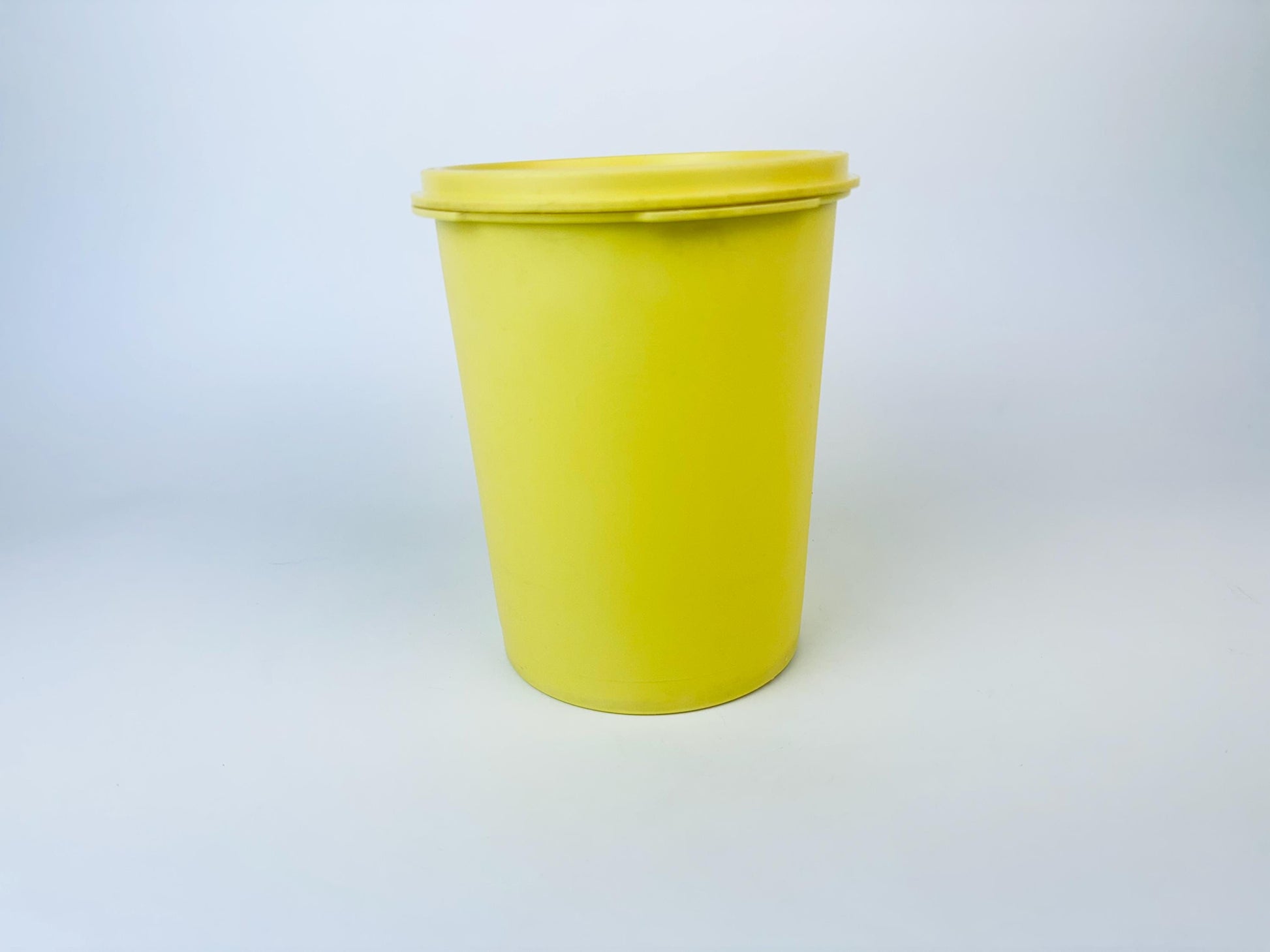 Product image for 'vintage yellow plastic tupperware servalier countertop container instant touch lid scroll pattern made in canada 1' (view d1e23c)