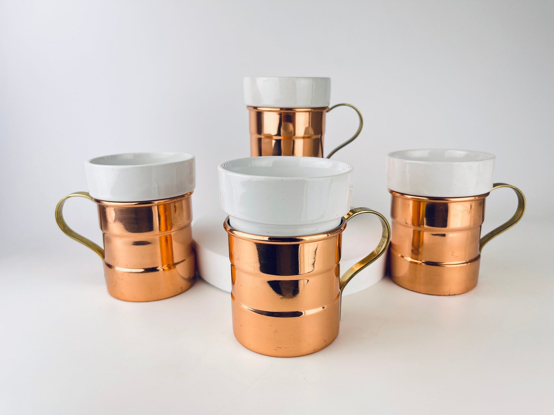 Product image for 'vintage baker hart stuart ceramic hot toddy mug glasses removable copper brass holder set of four 4 attractive aged brass patina' (view e7c968)