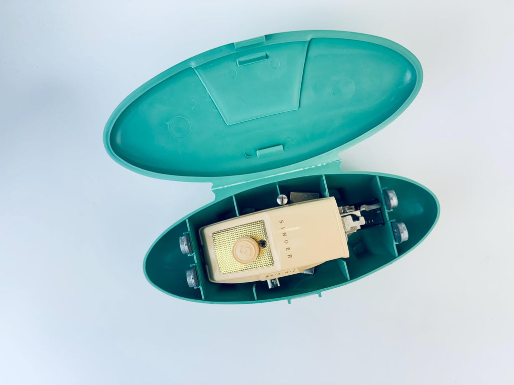 Product image for 'vintage singer slant shank buttonhole attachment 489510 patent 2482607 made in usa atomic jetsons aqua green case' (view ec36e7)