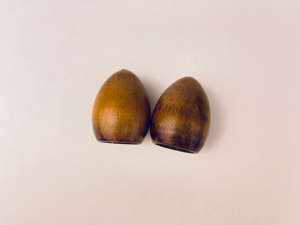 Product image for 'vintage mcm oblong shaped wood salt pepper wood shakers' (view 8d4674)