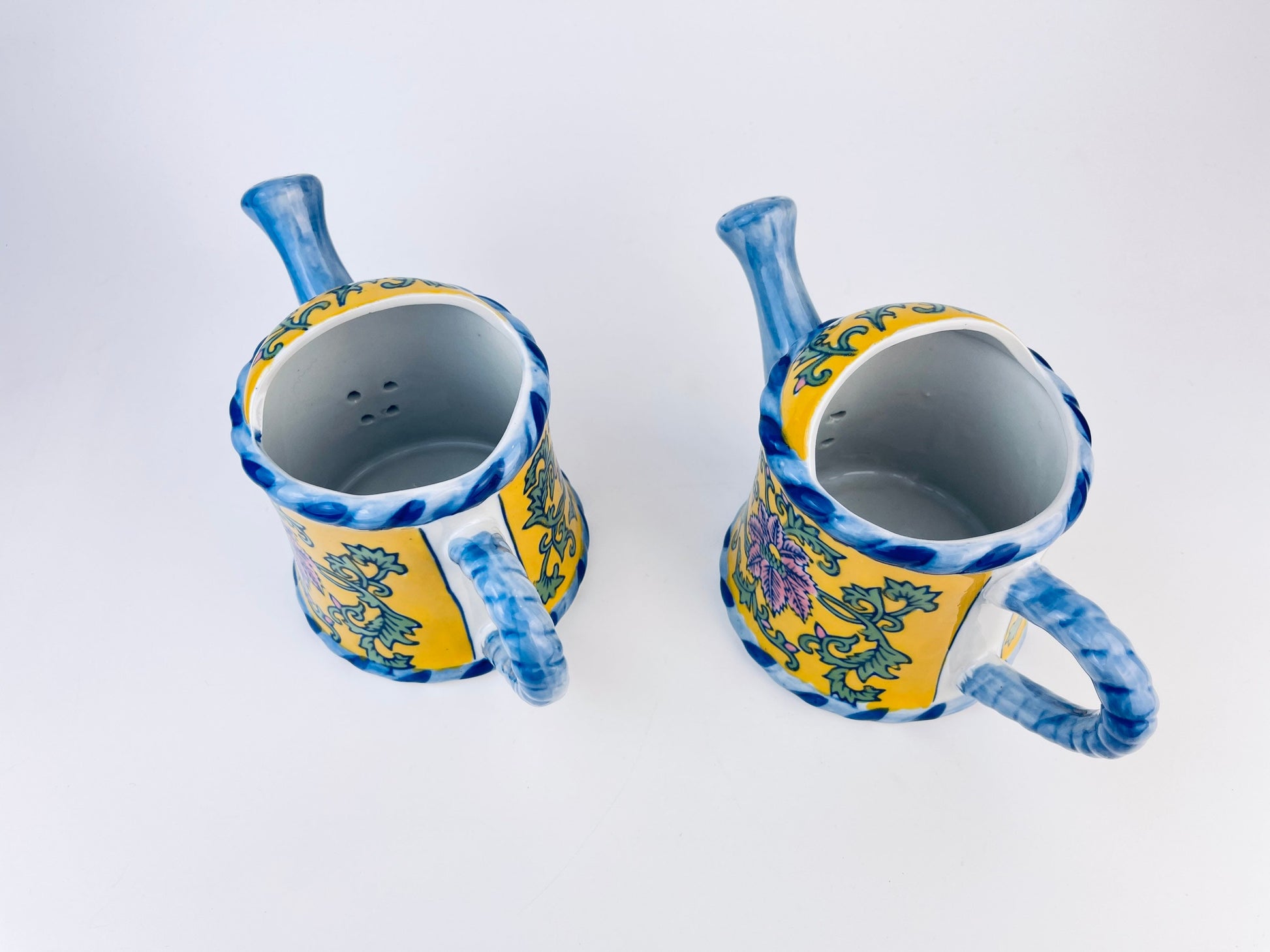 Product image for 'vintage hand painted blue yellow floral print ceramic watering can pot with handle rope handle bella case by ganz sold separately' (view 25e9a4)