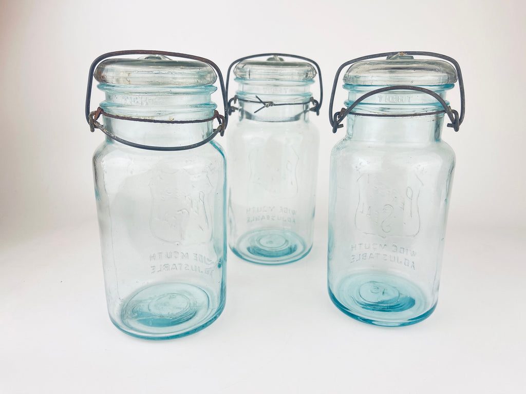 Product image for 'antique safety seal wide mouth aqua blue glass jar 2 pint capacity lightning metal hinge clasp made in canada sold separately' (view 746552)