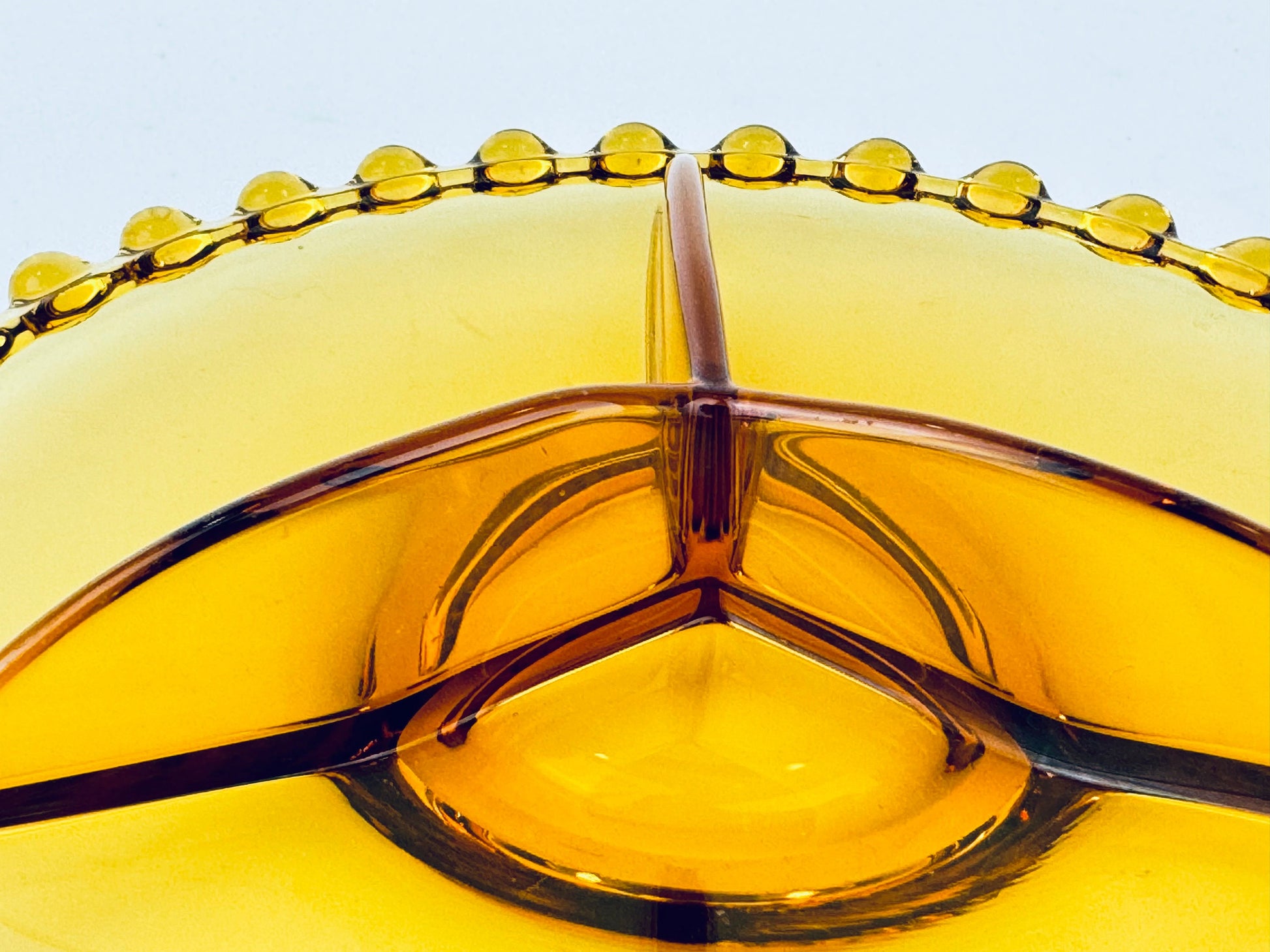 Product image for 'vintage amber candlewick boopie rimmbed glass divided nut dish plate 6' (view ec958c)