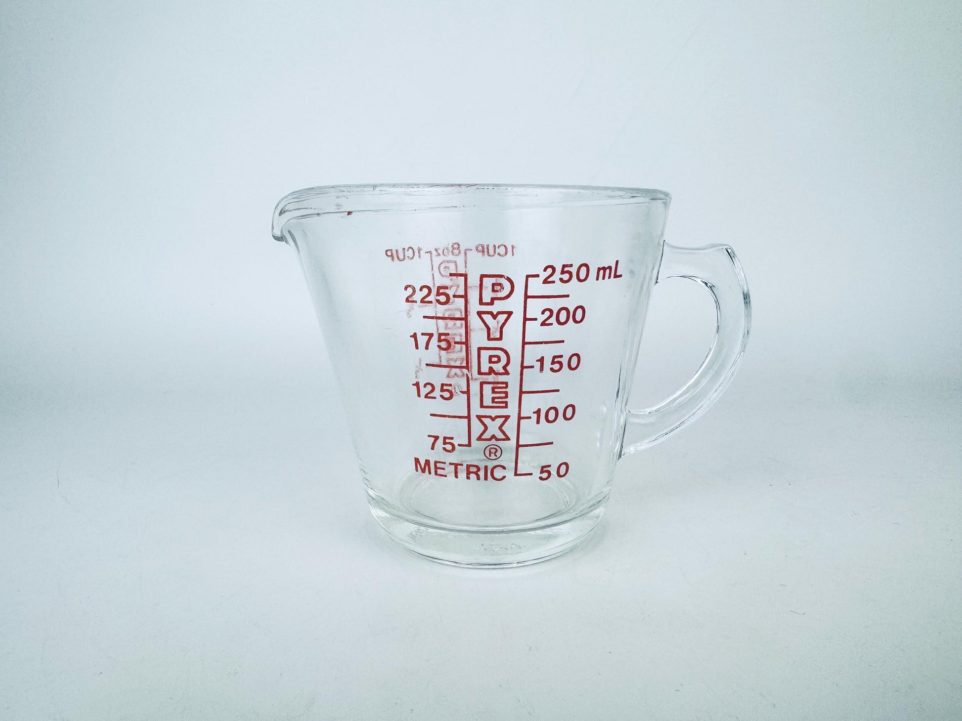 Product image for 'vintage red pyrex glass measuring cups metric imperial system made in usa sold separately' (view d3cb96)